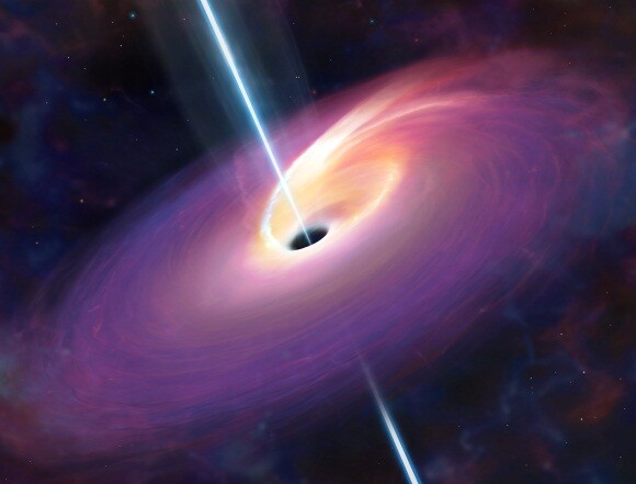 Ein Energiestrahl richtet sich zufälligerweise genau in Richtung unseres Sonnensystems. (Bild: University of Warwick/Mark A Garlick) Ein Energiestrahl richtet sich zufälligerweise genau in Richtung unseres Sonnensystems. (Bild: University of Warwick/Mark A Garlick)