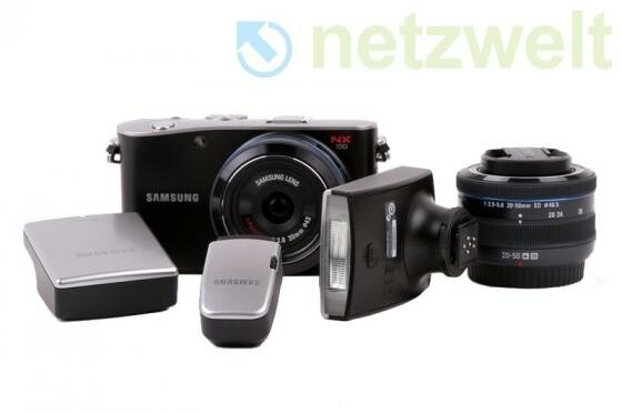 Die Systemkamera NX100 von Samsung mit ihrem umfangreichen Zubehör. (Bild: netzwelt.de) Die Systemkamera NX100 von Samsung mit ihrem umfangreichen Zubehör. (Bild: netzwelt.de)
