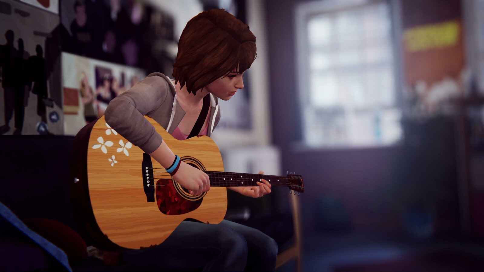 Mit fast allem kann Max interagieren, auch mit ihrer Gitarre im Wohnheimzimmer.