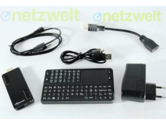 Der Android-HDMI-Stick TVPeCee MMS-874.Dual-Core zusammen mit Zubehör. Die Funktastatur befindet sich nicht im Lieferumfang.