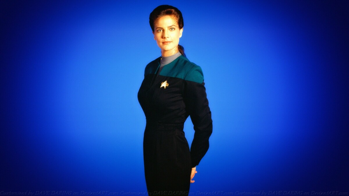 Star Trek Deep Space Nine: Jadzia Dax is a Trill.  Her symbiote carries the memories of Emony Dax, who worked with Georgiou.